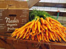 The carrots are washed and packed at the packing shed.